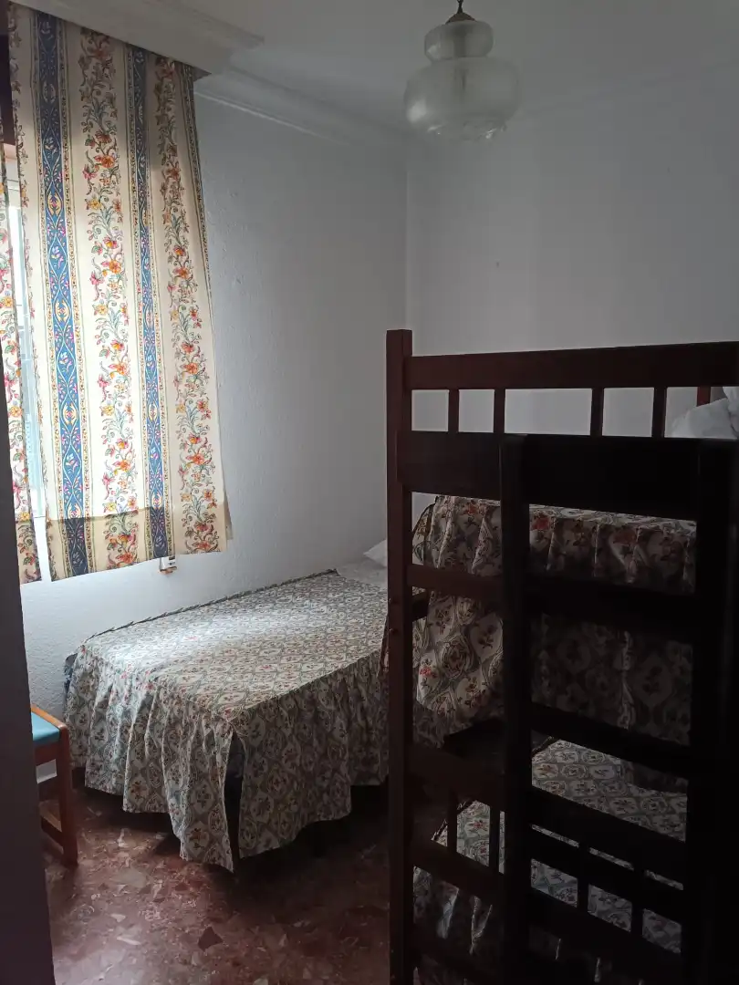 Schlafzimmer von Dachboden zum Verkauf in Punta Umbría mit Terrasse, Möbliert und Ofen