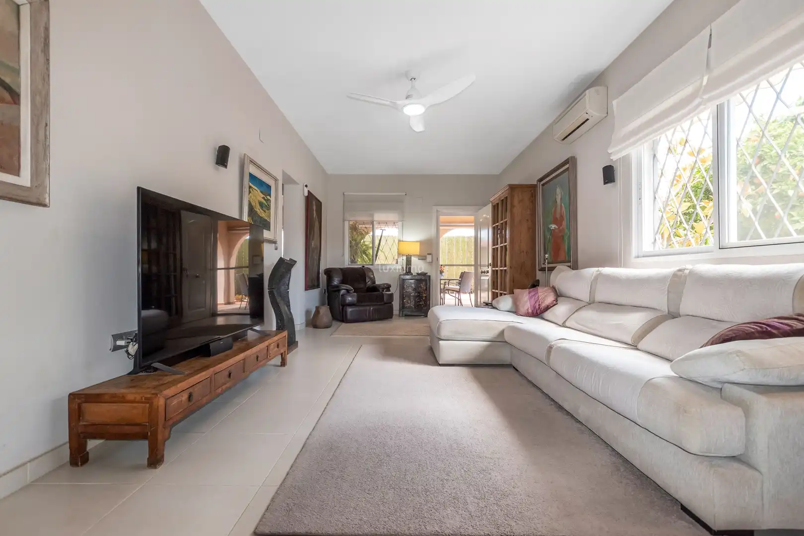 Sala d'estar de Casa o xalet en venda en L'Alfàs del Pi amb Aire condicionat i Terrassa