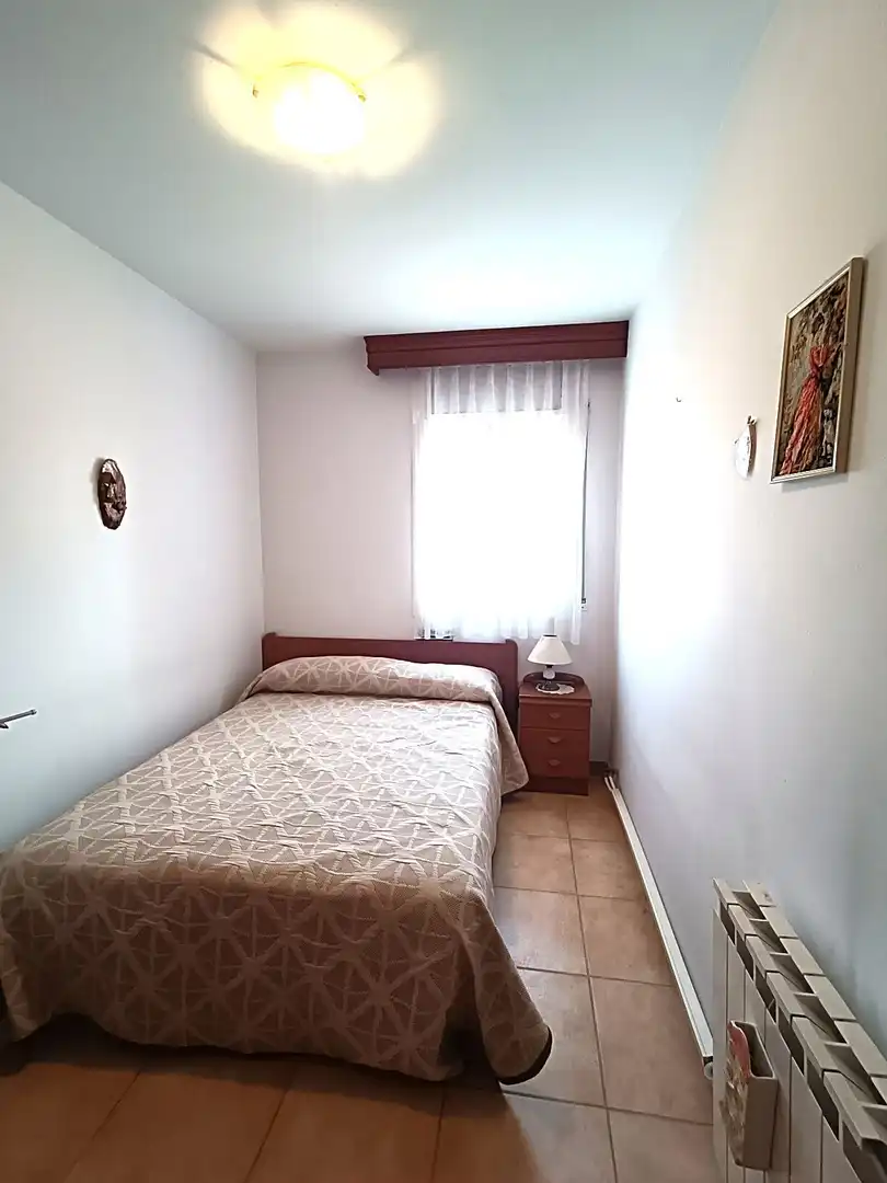 Schlafzimmer von Dachboden zum Verkauf in Calafell mit Klimaanlage, Heizung und Terrasse
