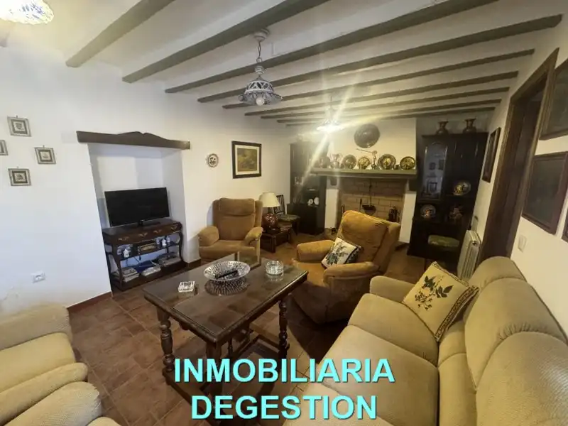 Sala de estar de Casa adosada en venta en Guarromán con Aire acondicionado, Calefacción y Jardín privado