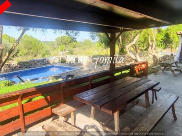 Casa rústica amb piscina en venda a es migjorn