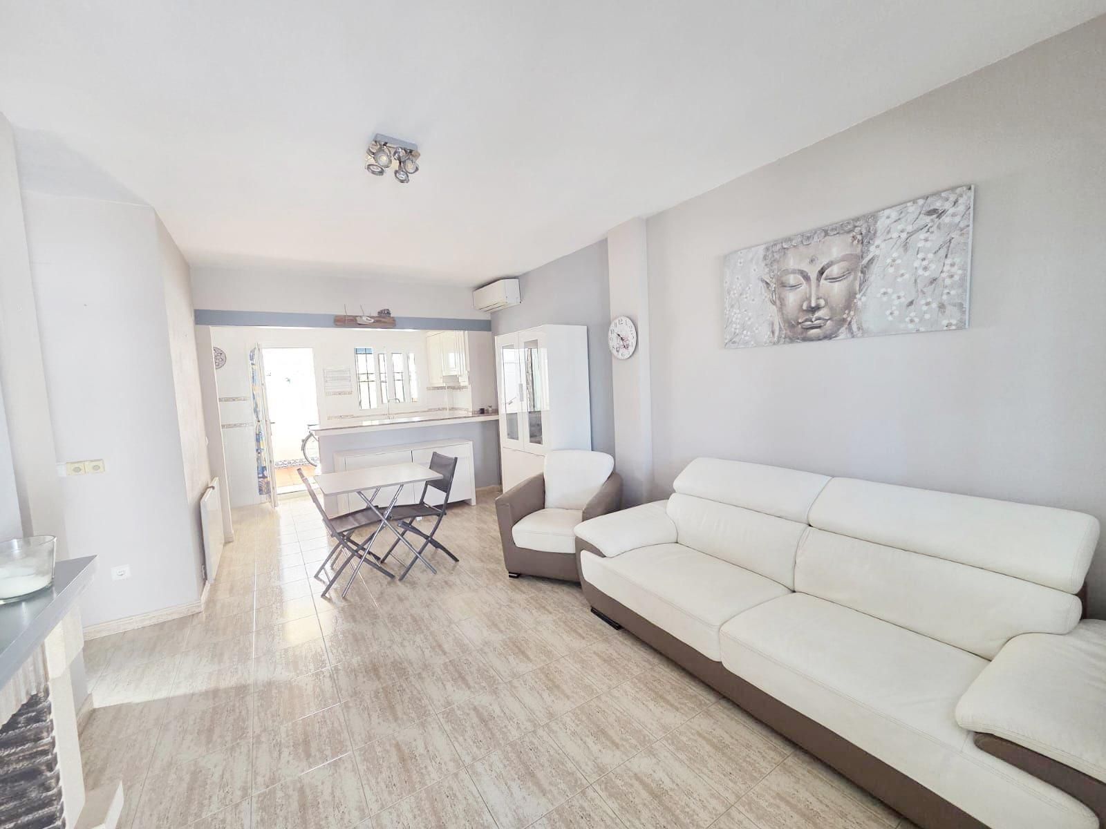 Sala d'estar de Casa adosada en venda en El Verger amb Aire condicionat, Calefacció i Jardí privat