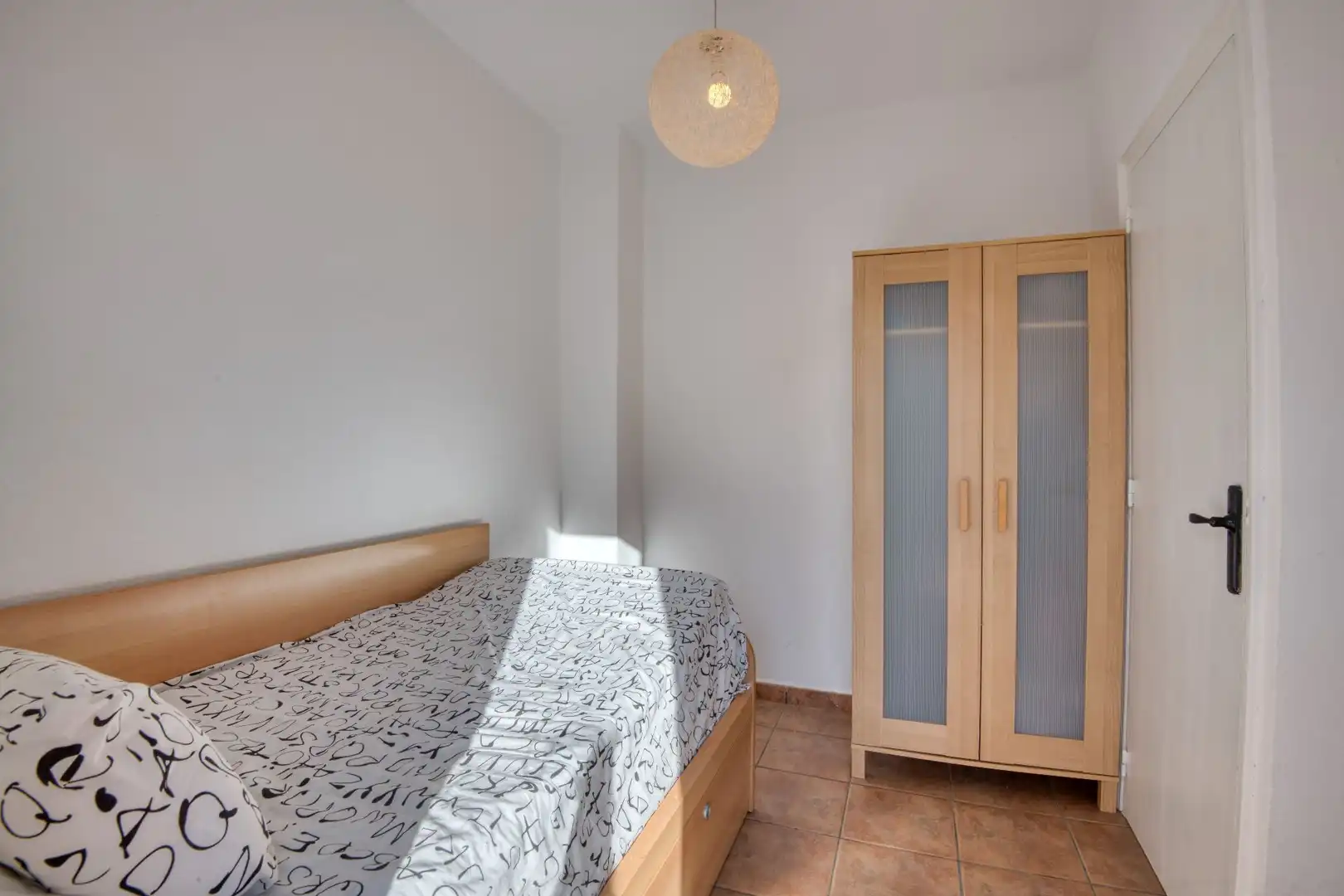 Habitación de Casa adosada en venta en L'Escala con Terraza y Amueblado