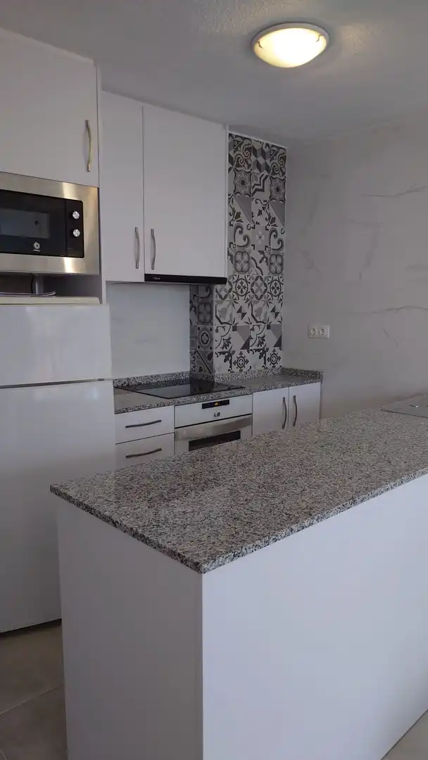 Küche von Wohnungen zum Verkauf in Calpe / Calp mit Klimaanlage, Privatgarten und Terrasse
