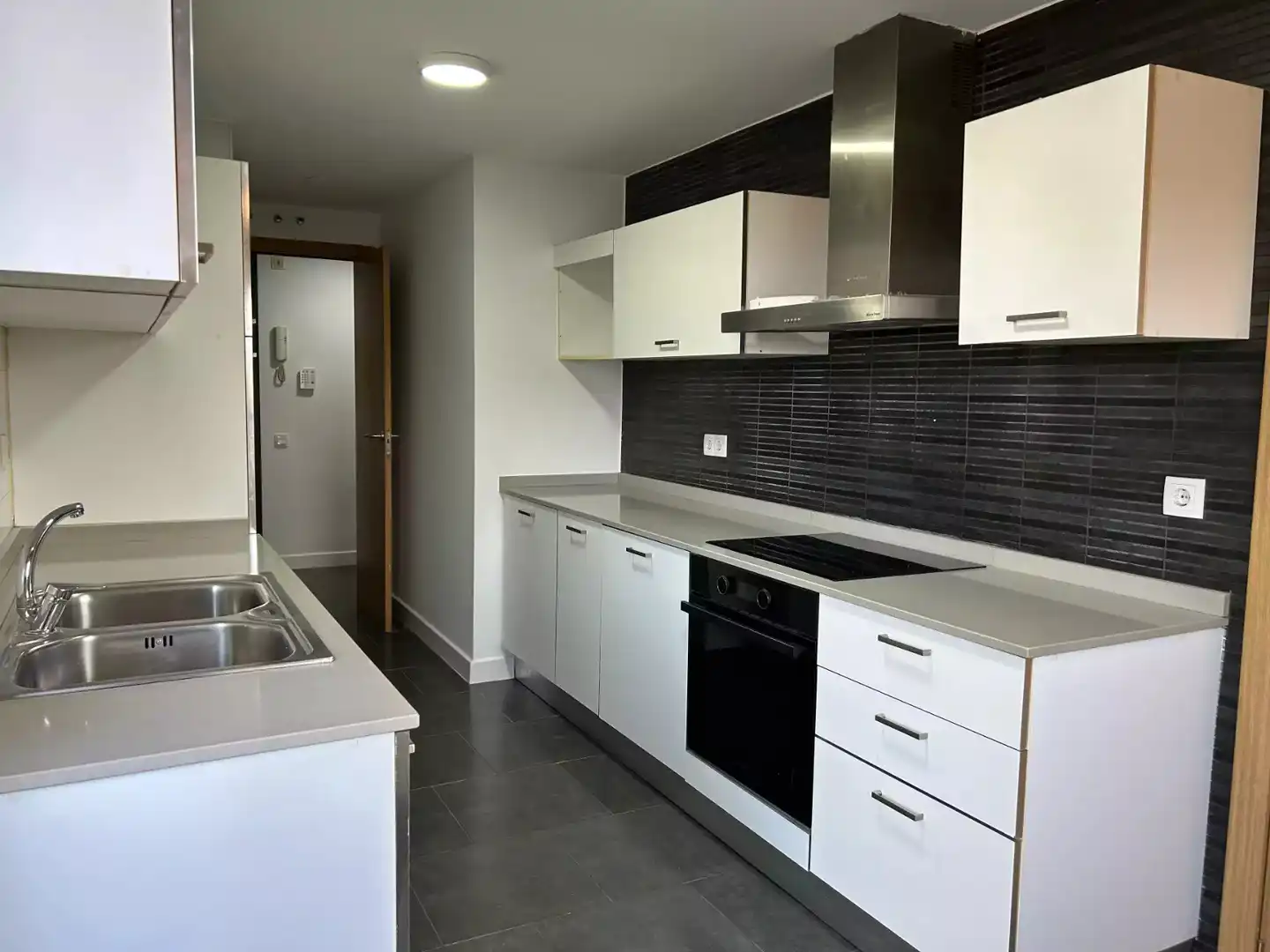 Kitchen of Flat for sale in Hostalric  with Parquet flooring, Terrace and Storage room