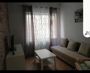 Living room of Flat for sale in  Almería Capital  with Air Conditioner, Furnished and Oven