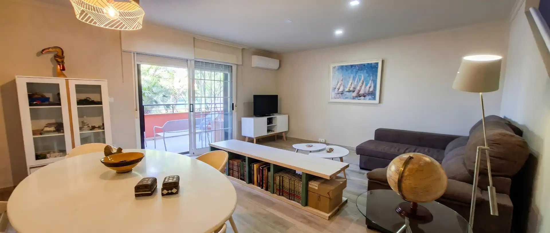 Sala d'estar de Casa adosada en venda en Sant Joan d'Alacant amb Aire condicionat, Jardí privat i Terrassa