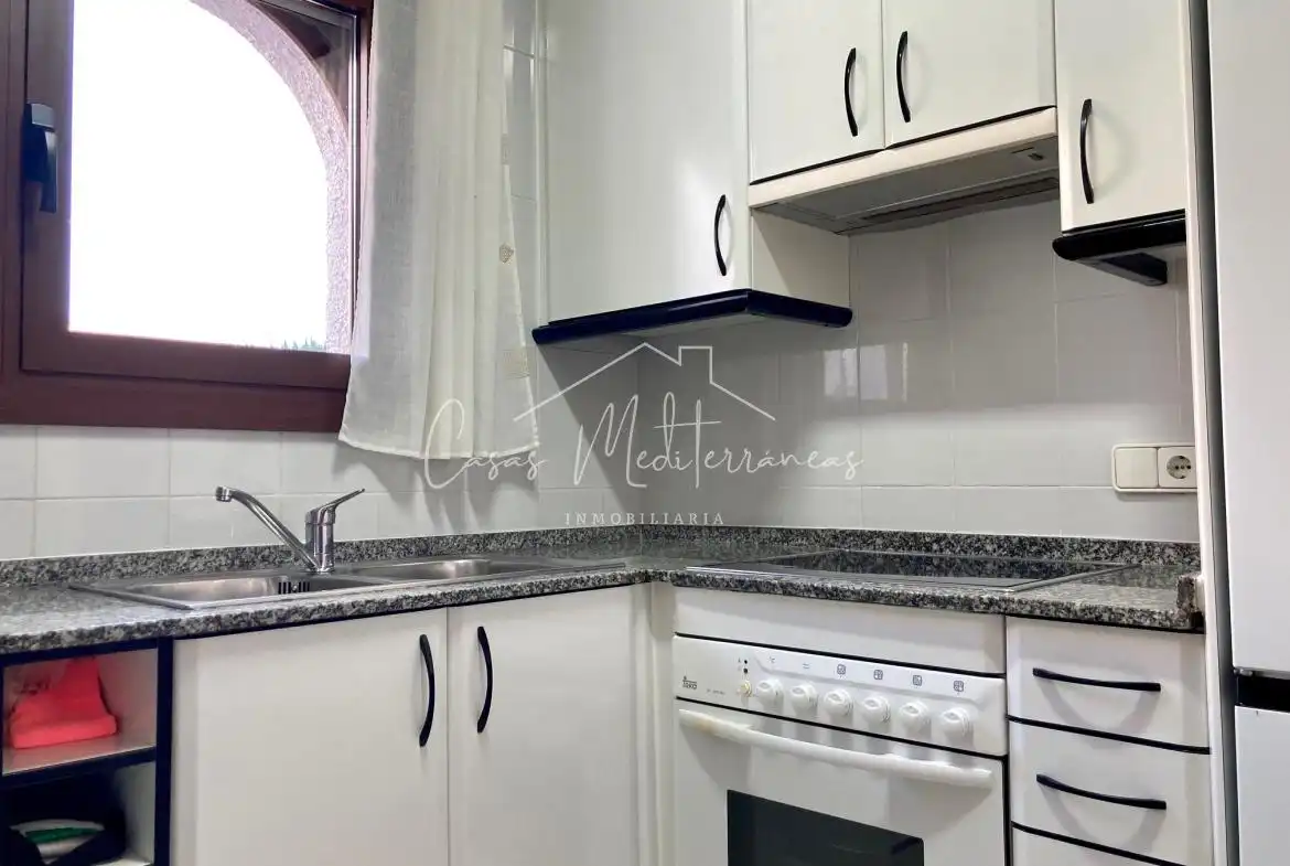 Cocina de Casa adosada de alquiler en Vandellòs i l'Hospitalet de l'Infant con Jardín privado, Terraza y Amueblado