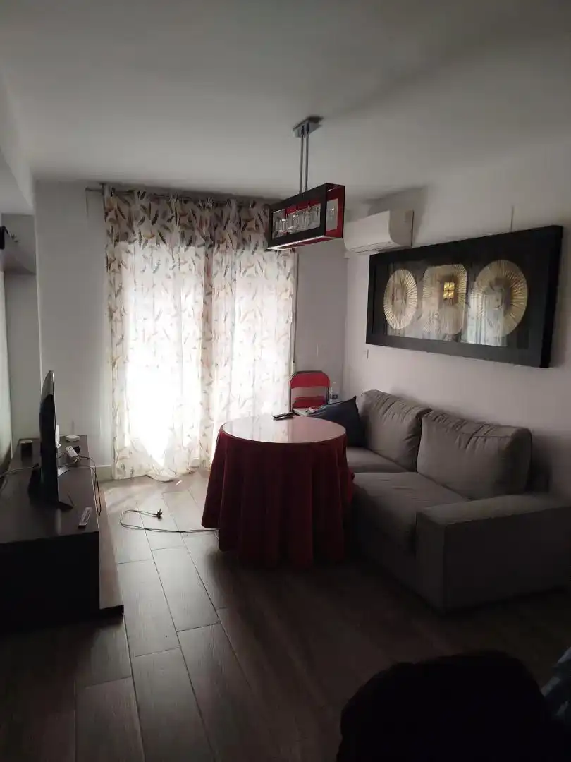 Sala de estar de Piso para compartir en Granada con Aire acondicionado, Amueblado y Horno