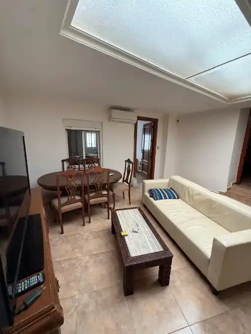 Sala d'estar de Casa adosada en venda en Puertollano amb Aire condicionat, Calefacció i Moblat