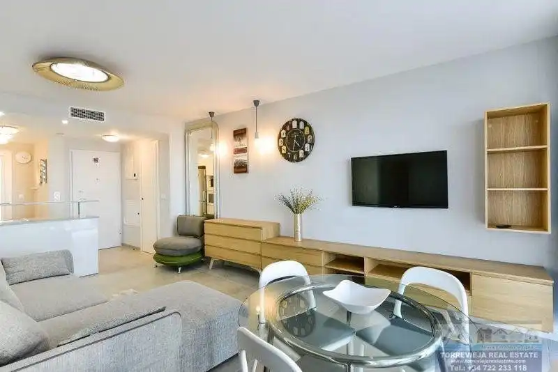 Sala de estar de Apartamento en venta en Torrevieja con Aire acondicionado, Terraza y Piscina
