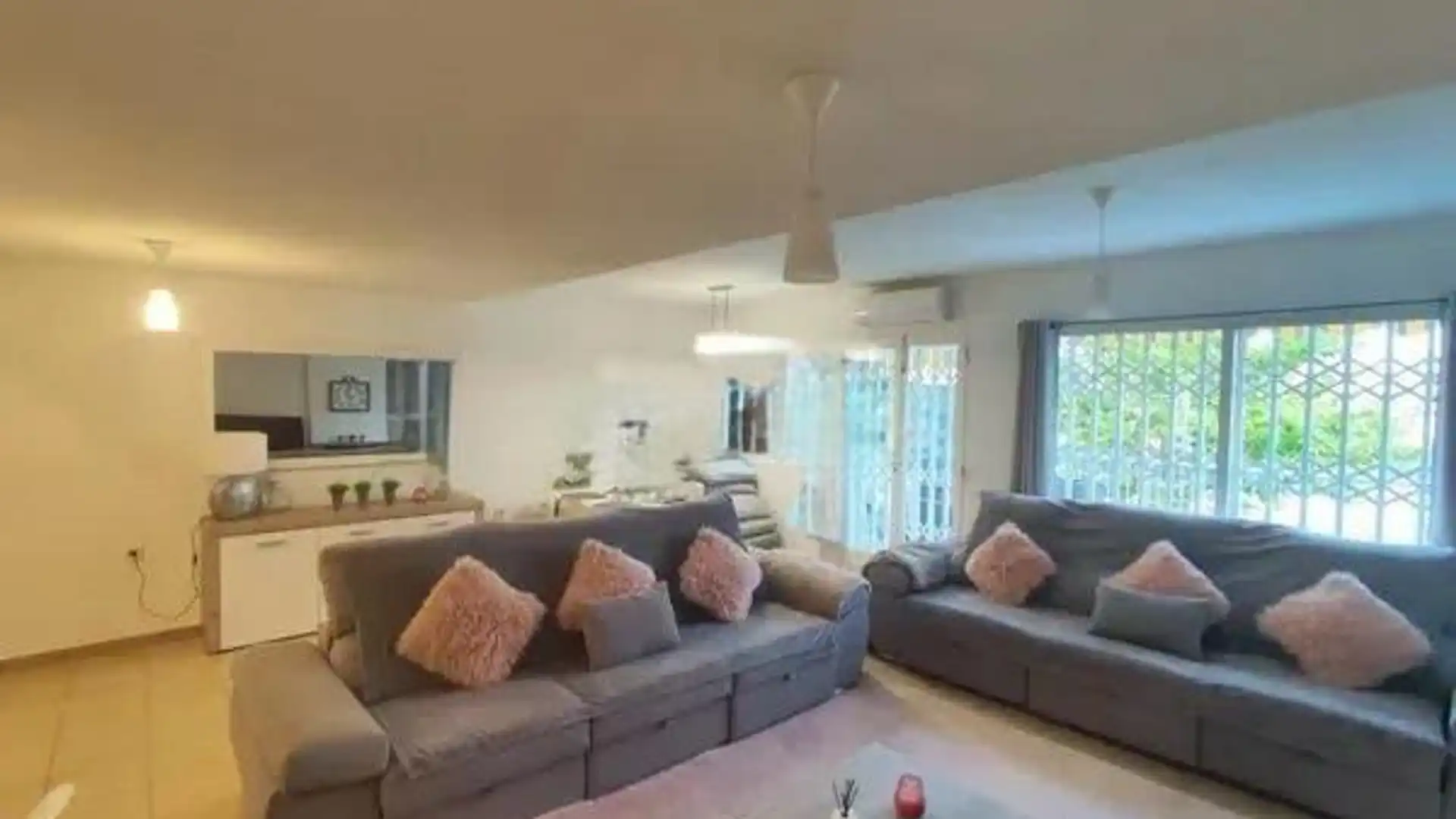 Sala de estar de Casa adosada en venta en Benidorm con Aire acondicionado, Jardín privado y Terraza