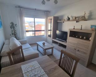 Sala d'estar de Apartament de lloguer en Sanxenxo amb Moblat, Forn i Rentadora