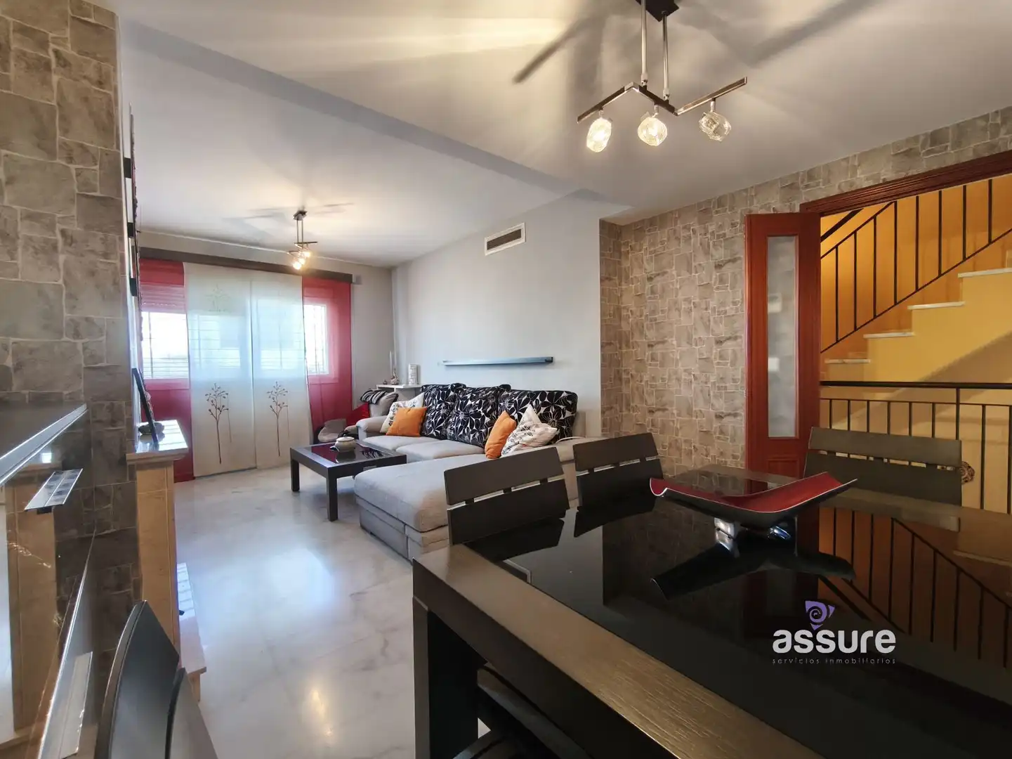Sala de estar de Casa adosada en venta en Huelva con Aire acondicionado, Calefacción y Jardín privado