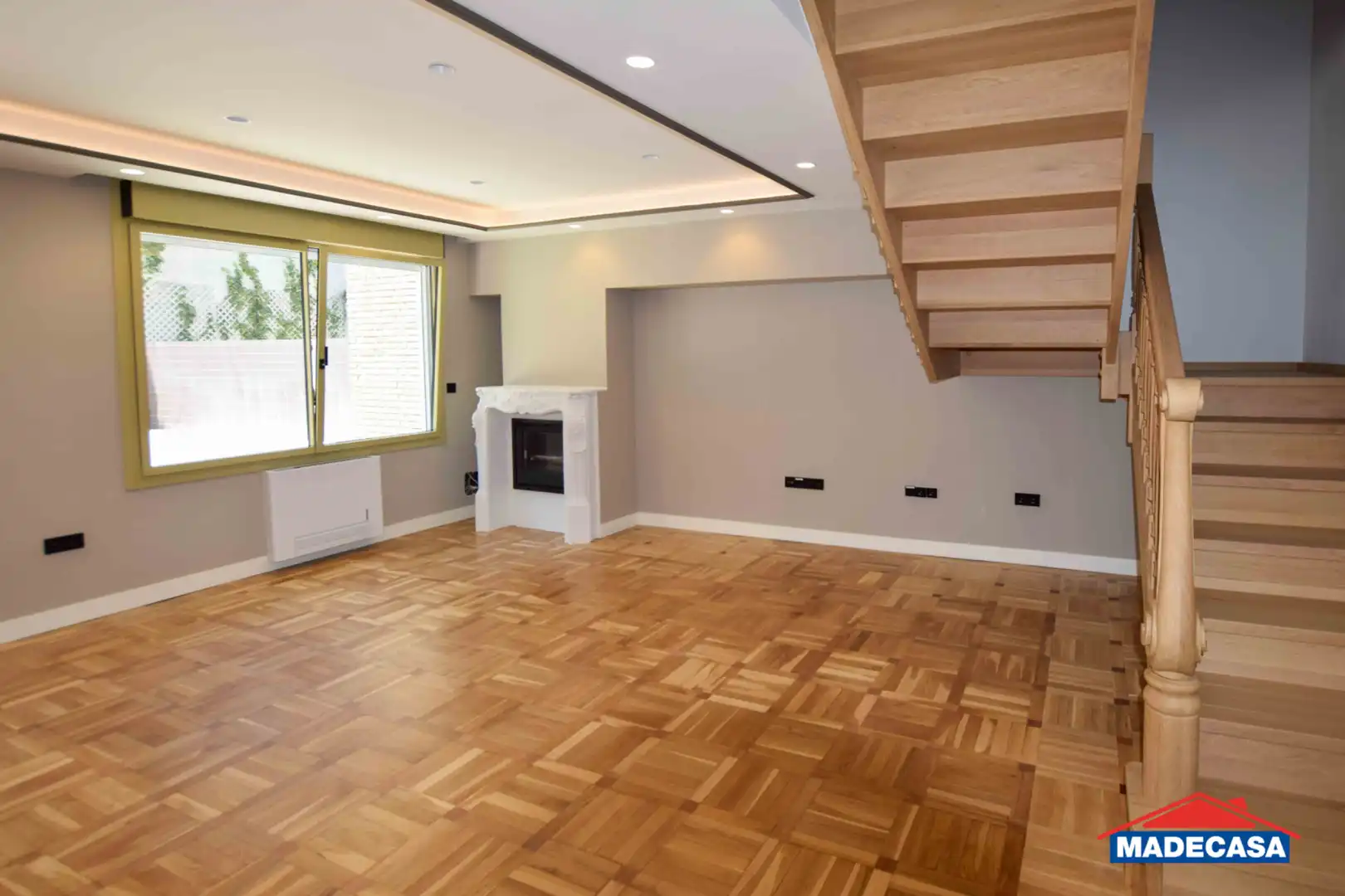 Sala d'estar de Casa adosada en venda en Pozuelo de Alarcón amb Aire condicionat, Calefacció i Jardí privat