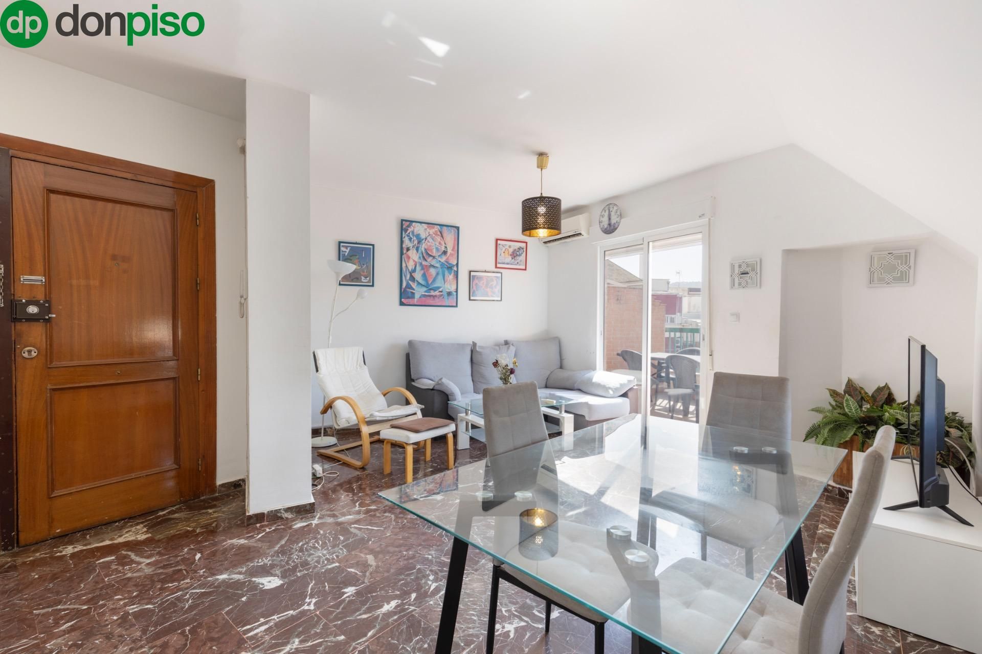 Wohnzimmer von Dachboden zum verkauf in  Granada Capital mit Klimaanlage, Heizung und Terrasse