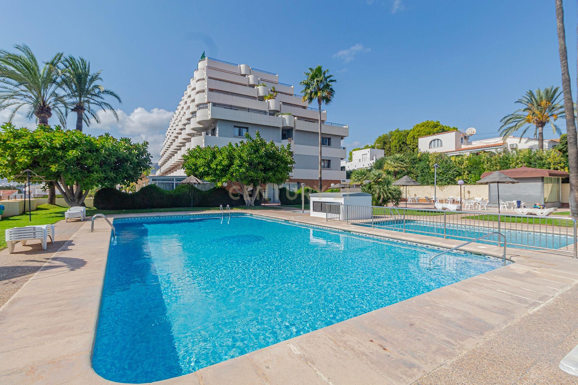 Swimming pool of Apartment for sale in Calpe / Calp  with Air Conditioner, Storage room and Washing machine