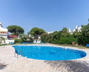 Swimming pool of Apartment for sale in Estepona