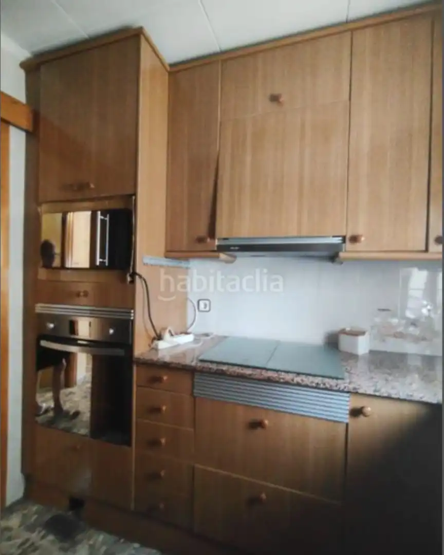 Cuina de Casa o xalet en venda en Barcelona amb Calefacció, Parquet i Terrassa