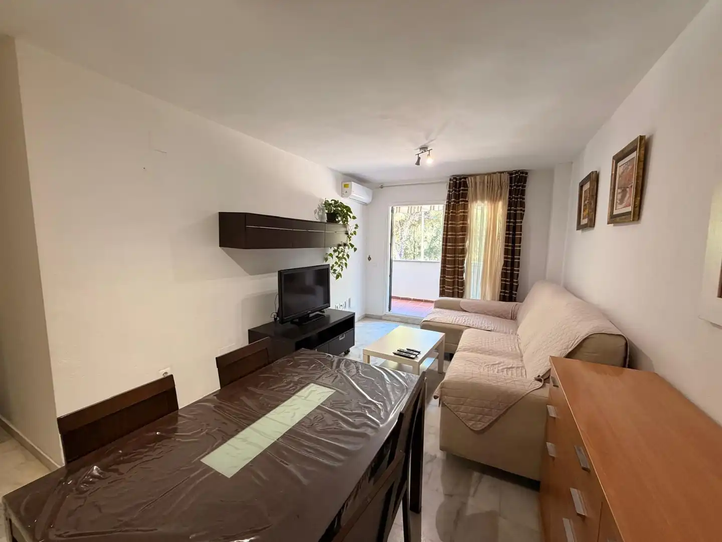 Living room of Flat for rent in Benalmádena  with Air Conditioner, Heating and Private garden