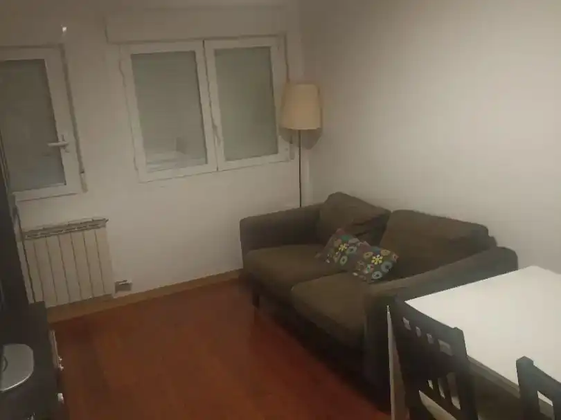 Sala de estar de Piso para compartir en Huesca con Aire acondicionado, Parquet y Amueblado