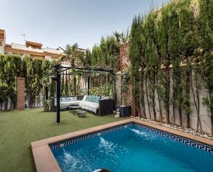 Swimming pool of Single-family semi-detached for sale in Vegas del Genil  with Air Conditioner, Heating and Private garden