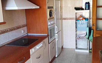 Kitchen of Duplex for sale in Dos Hermanas  with Air Conditioner, Heating and Terrace