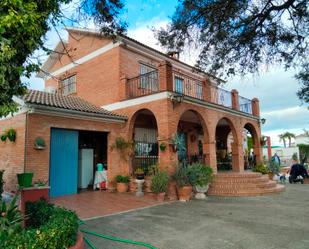 Vista exterior de Casa o xalet en venda en Palma del Río amb Aire condicionat, Terrassa i Piscina