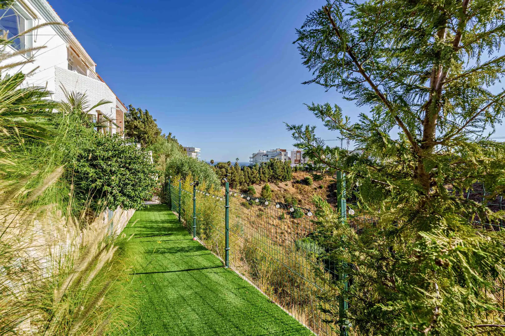 Jardí de Casa adosada en venda en Benalmádena amb Aire condicionat, Jardí privat i Terrassa