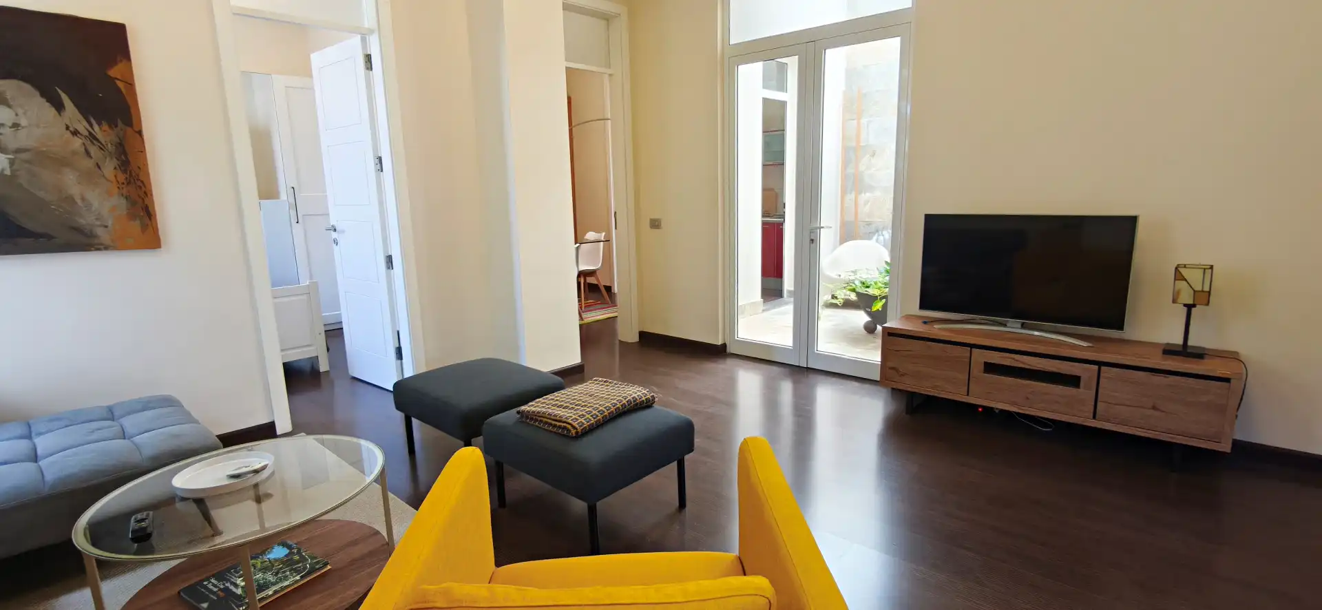 Sala d'estar de Pis de lloguer en Santa Cruz de Tenerife amb Aire condicionat, Jardí privat i Parquet