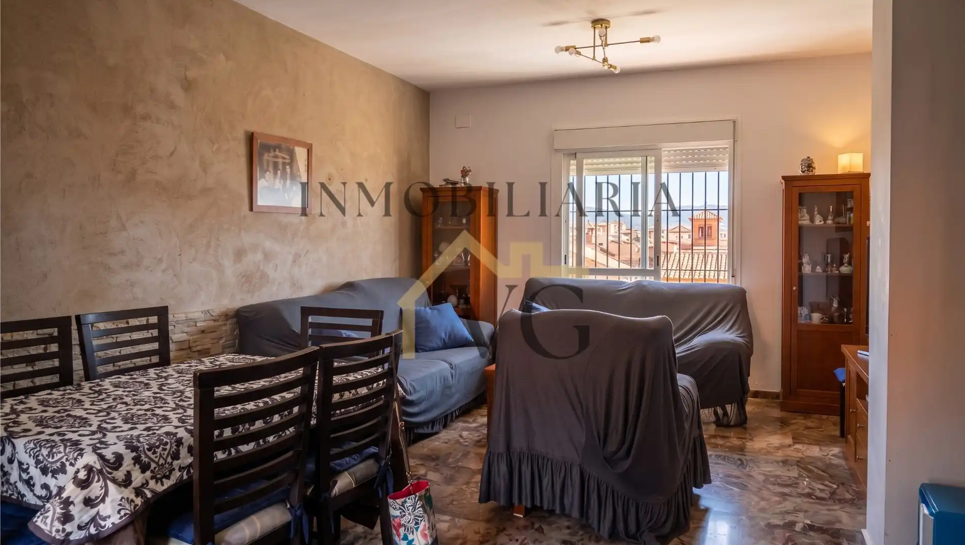 Sala d'estar de Casa adosada en venda en Guillena amb Calefacció, Terrassa i Traster