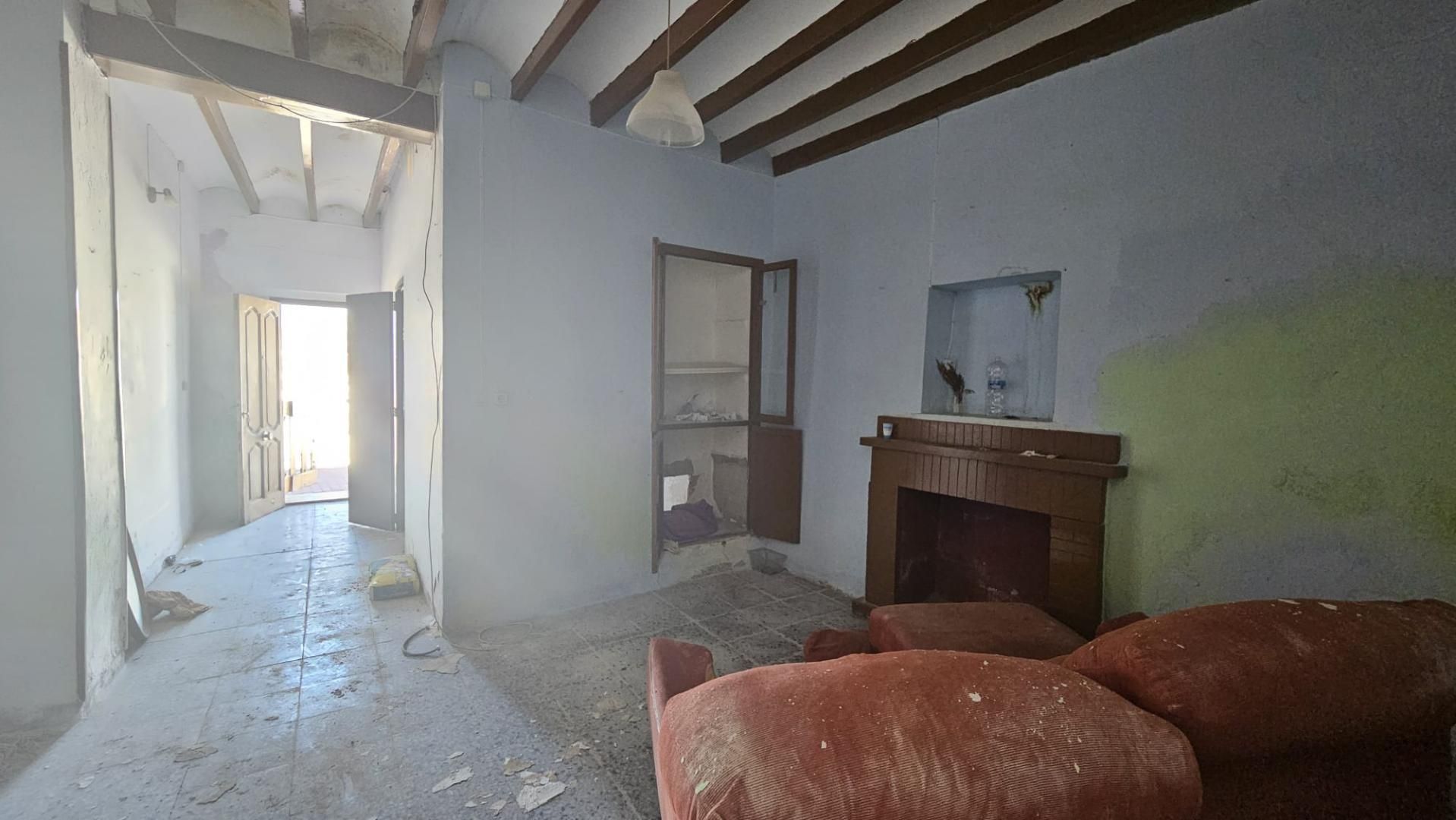 Sala d'estar de Casa adosada en venda en Benidoleig amb Terrassa