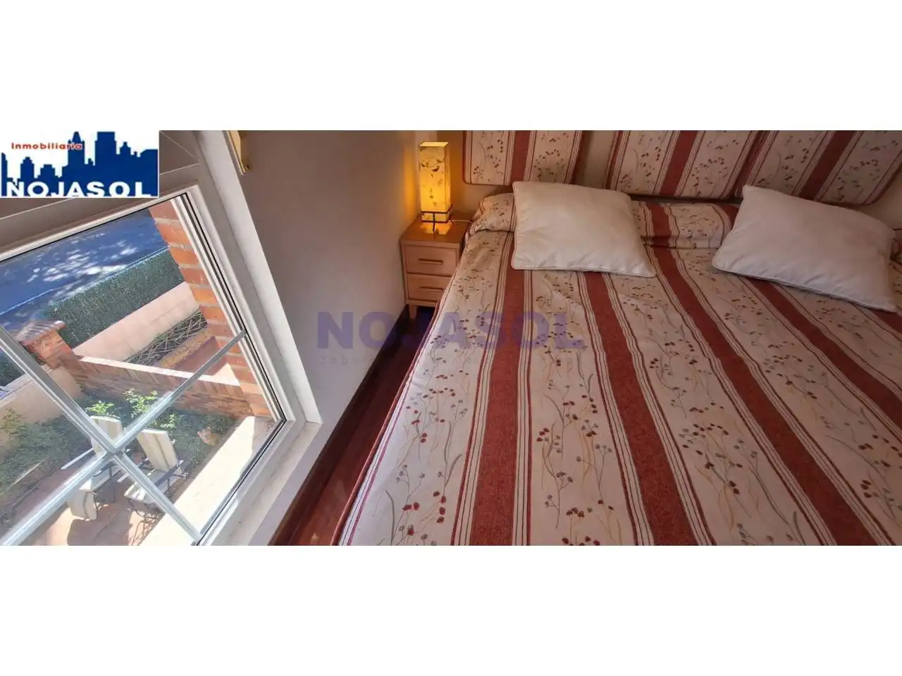 Dormitori de Apartament de lloguer en Noja amb Calefacció, Terrassa i Moblat