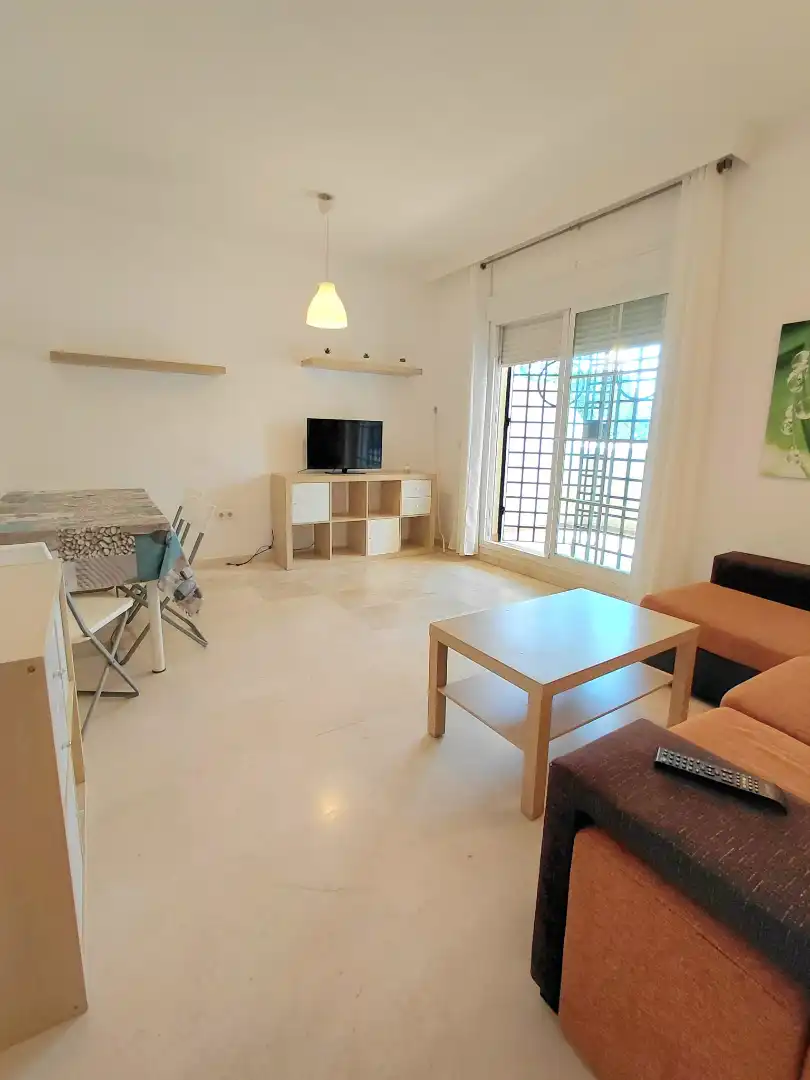 Sala de estar de Apartamento en venta en Benalmádena con Aire acondicionado, Terraza y Amueblado