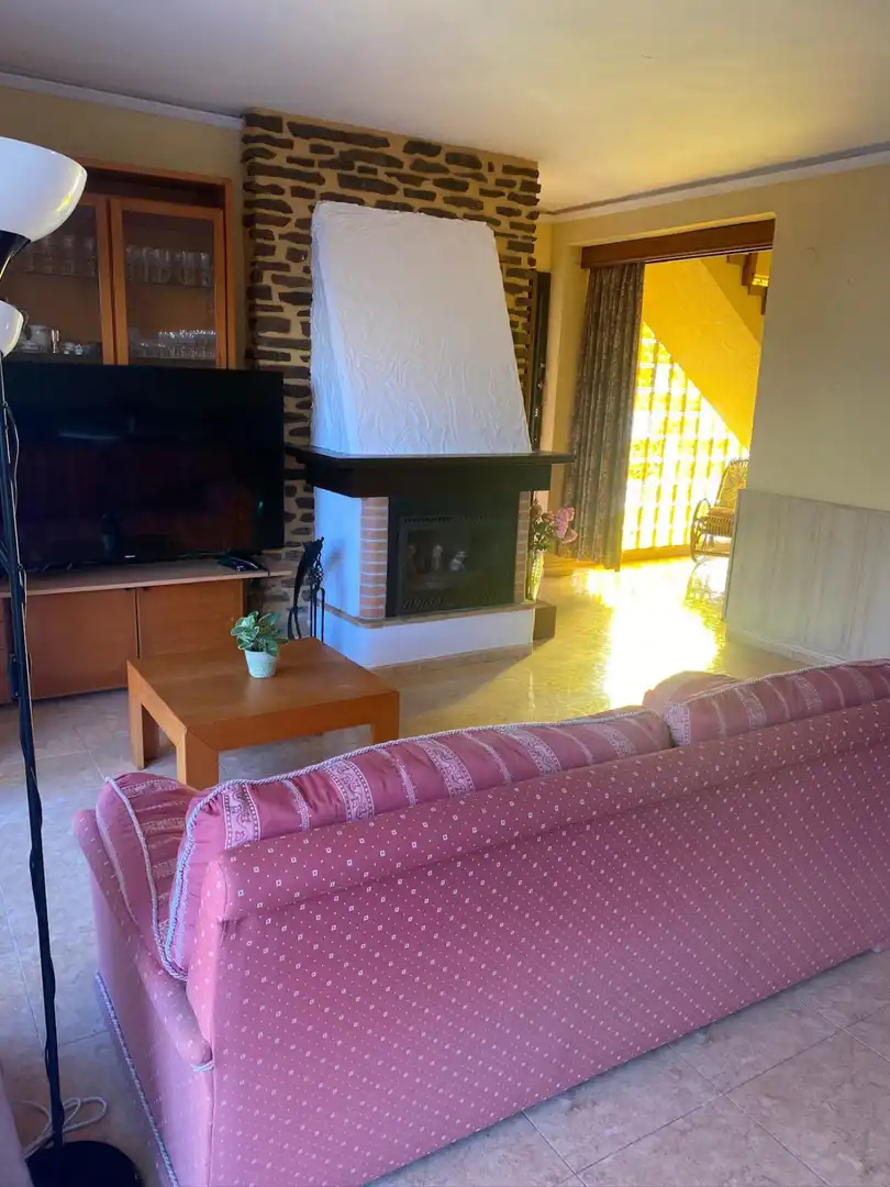 Sala d'estar de Casa o xalet en venda en Sagunto / Sagunt amb Aire condicionat, Jardí privat i Terrassa