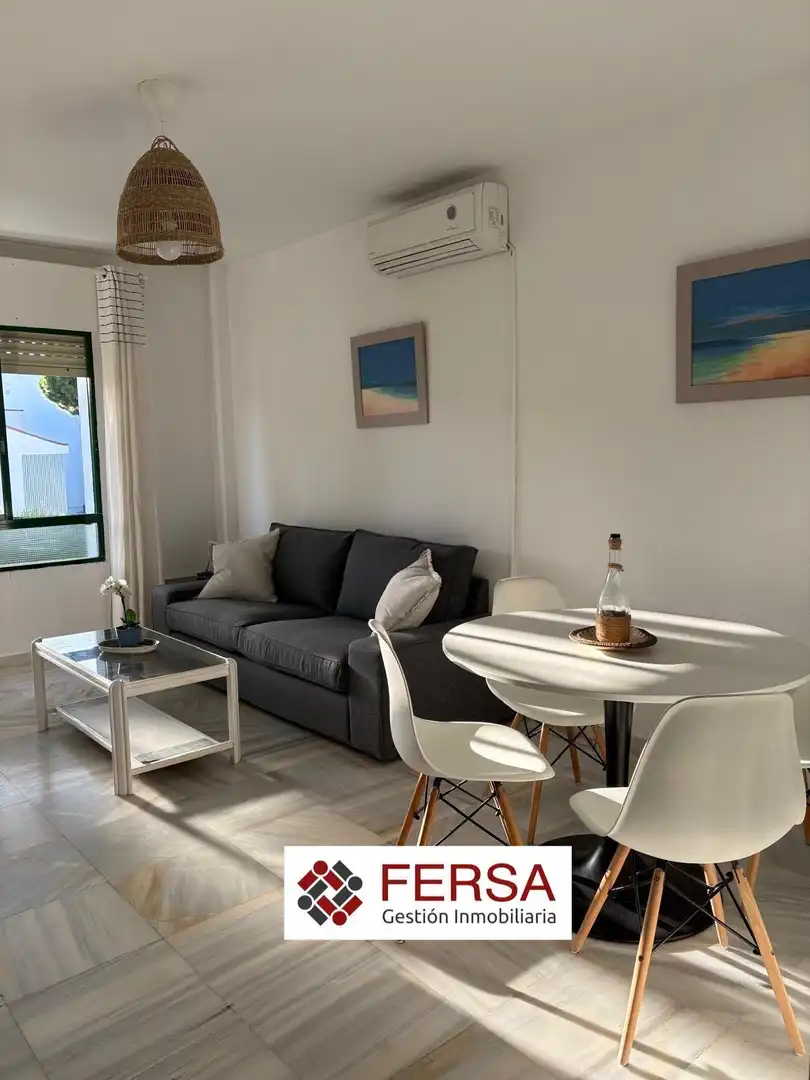 Living room of Flat for rent in El Puerto de Santa María  with Air Conditioner, Private garden and Furnished
