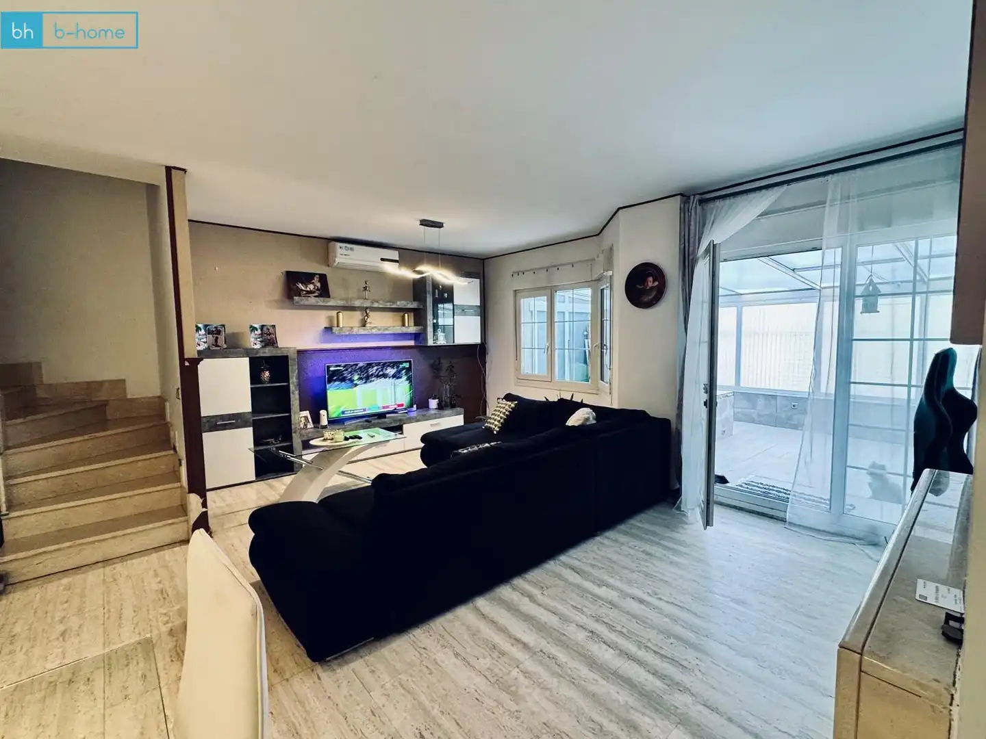 Sala d'estar de Casa adosada en venda en Villanueva del Pardillo