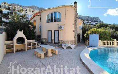 Vista exterior de Casa o xalet en venda en Calpe / Calp amb Aire condicionat, Jardí privat i Terrassa