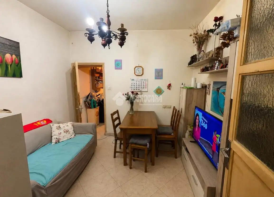 Sala d'estar de Casa adosada en venda en Madrid amb Calefacció