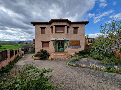 Vista exterior de Casa o xalet en venda en Torrelaguna amb Jardí privat i Terrassa