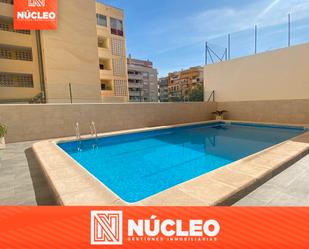 Swimming pool of Planta baja for sale in Torrevieja  with Air Conditioner, Furnished and Oven