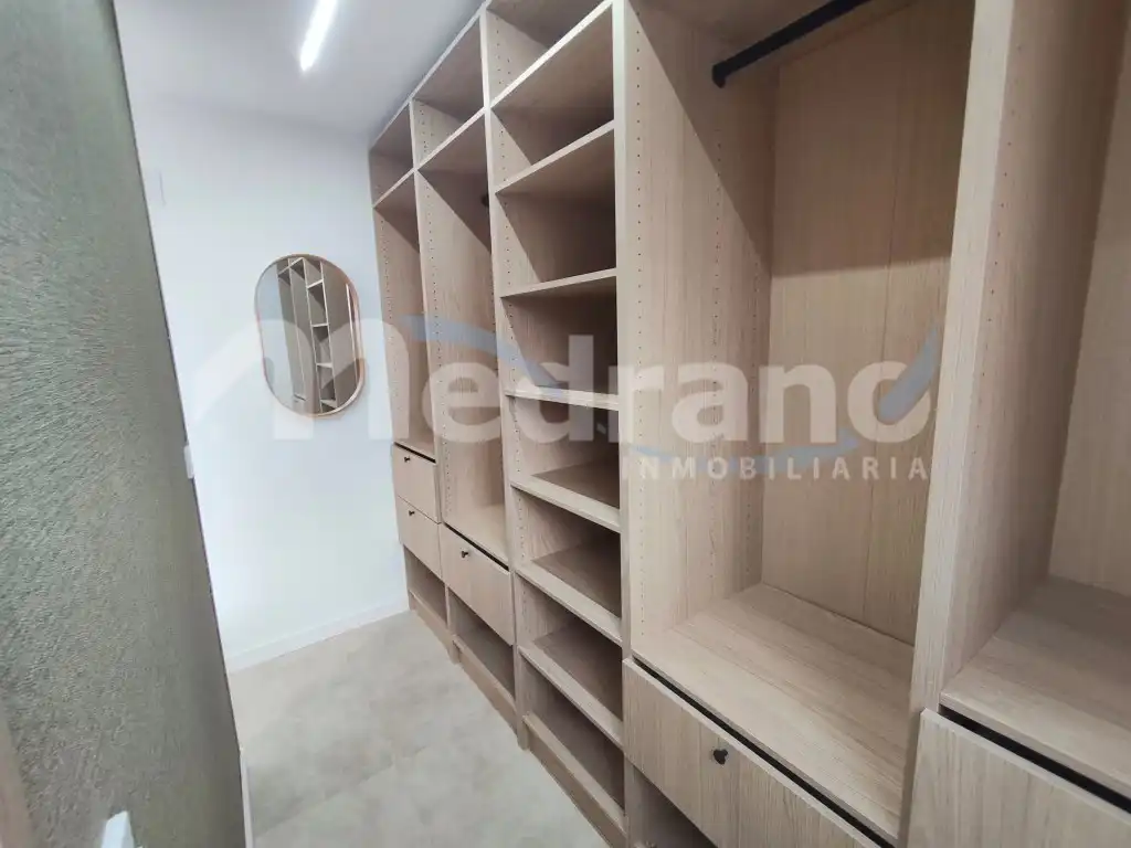 Habitación de Apartamento de alquiler en La Nucia con Aire acondicionado, Calefacción y Jardín privado