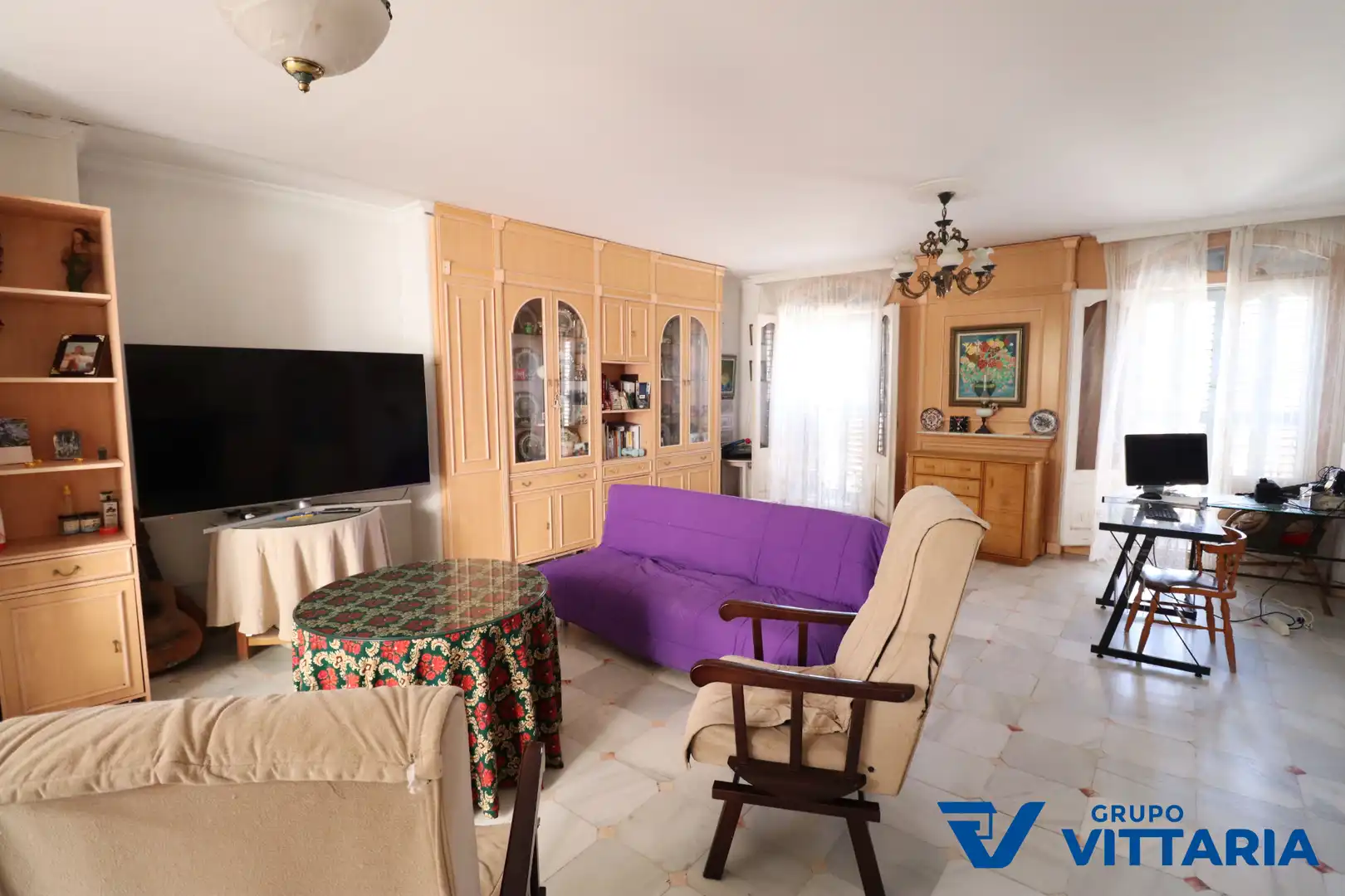 Sala de estar de Casa adosada en venta en Almería con Aire acondicionado, Terraza y Trastero