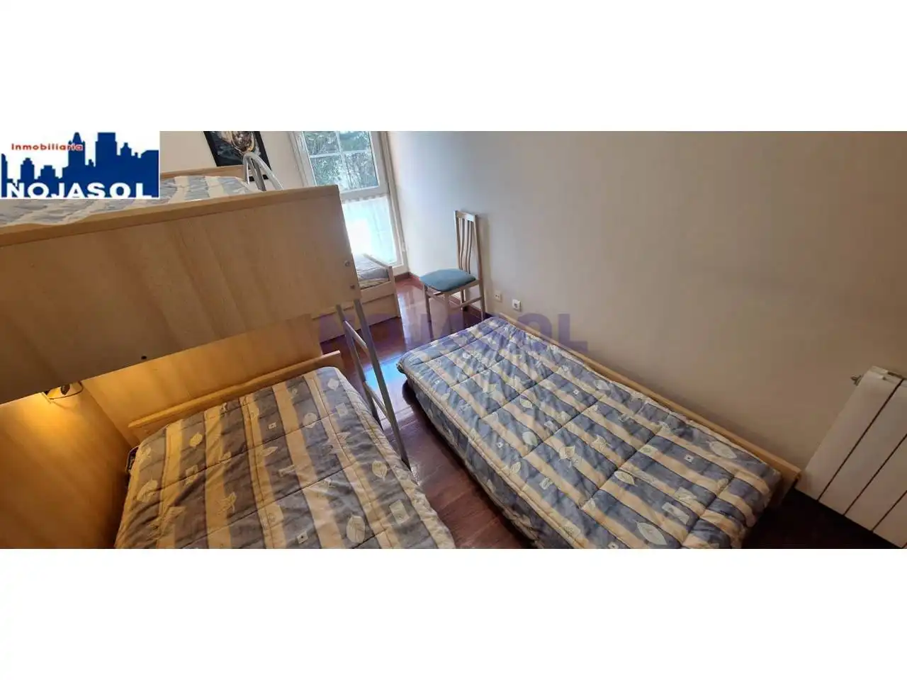 Dormitori de Apartament de lloguer en Noja amb Calefacció, Terrassa i Moblat