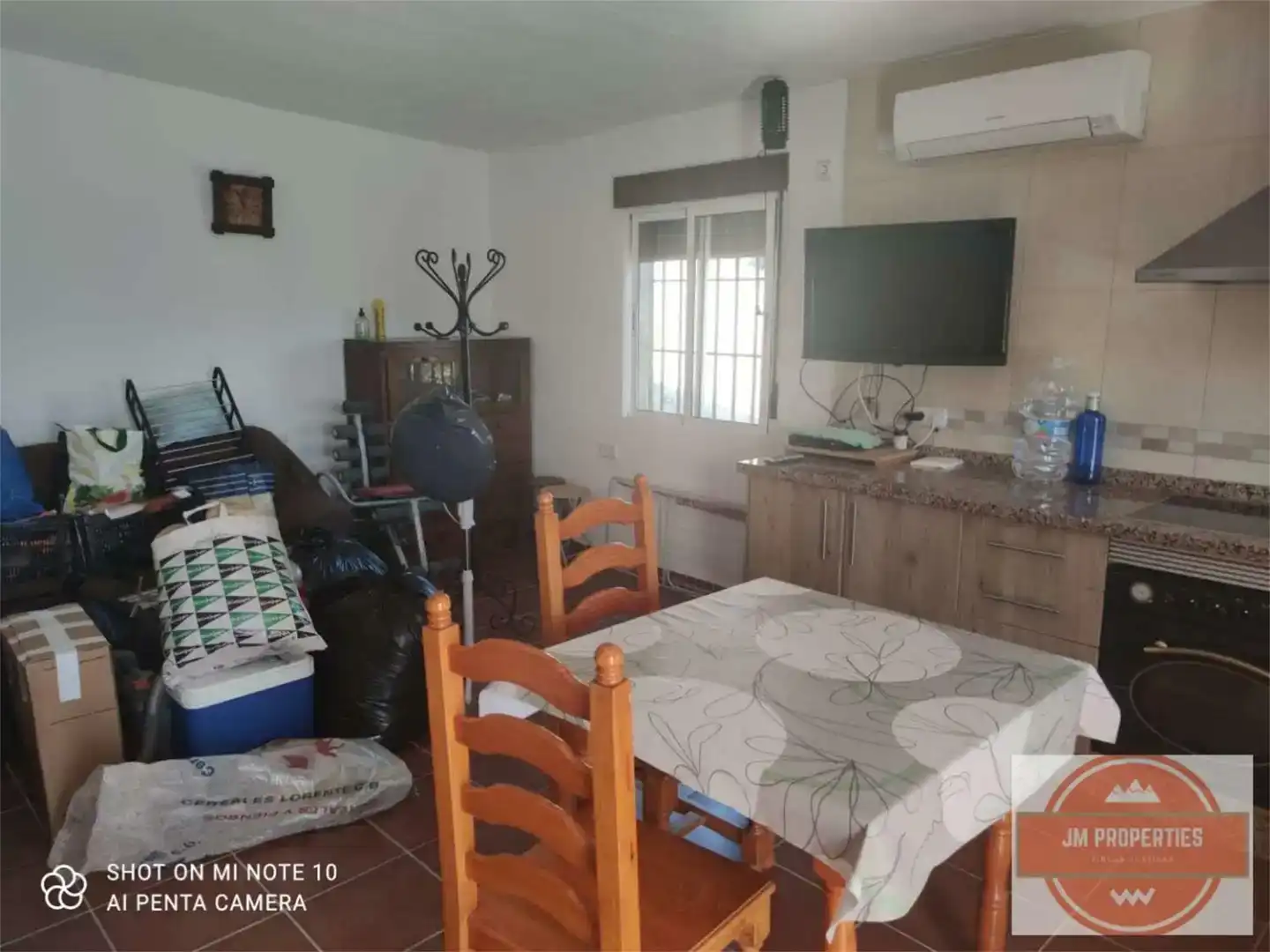 Sala de estar de Terreno en venta en Almáchar, Málaga