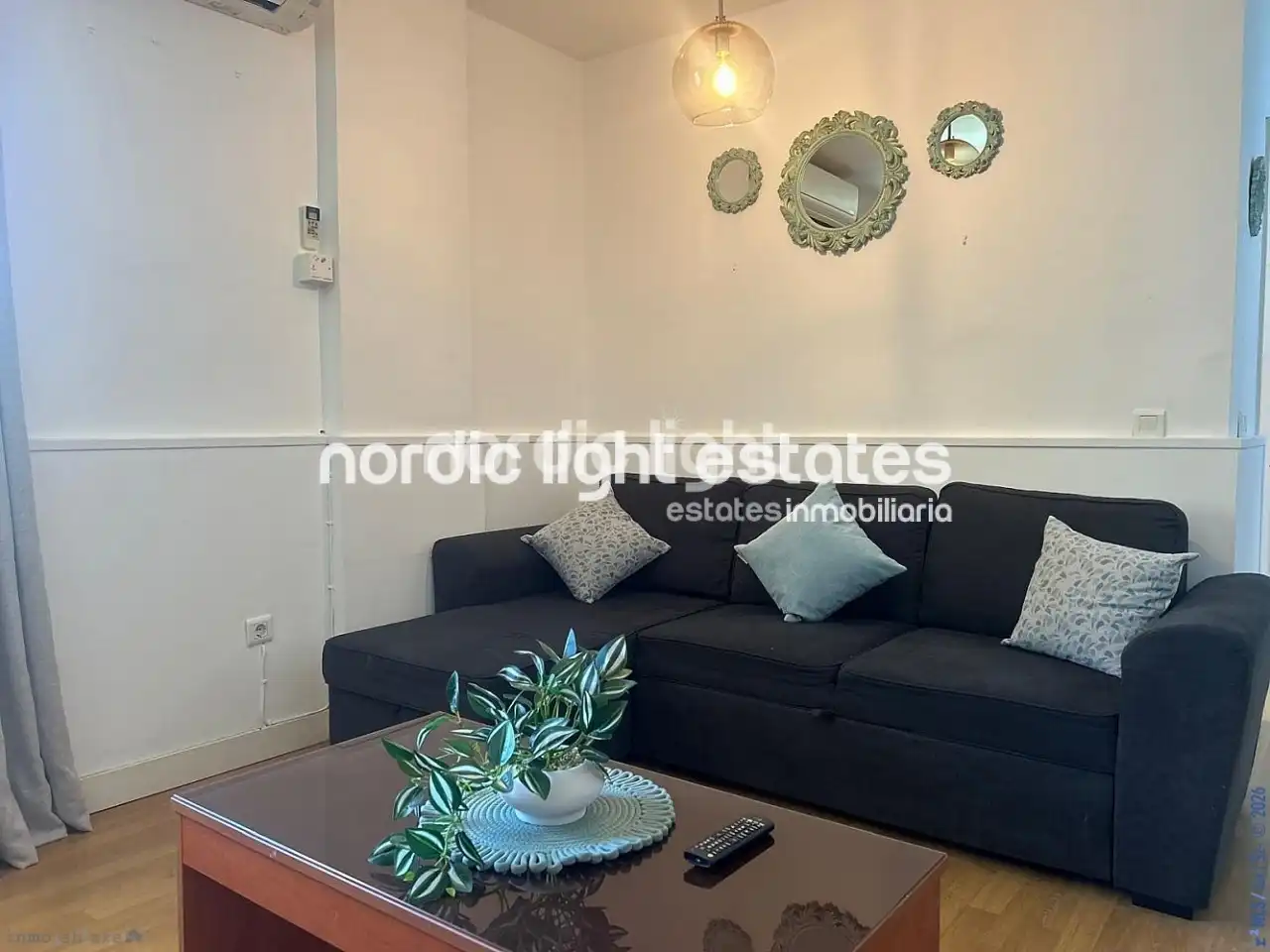 Sala de estar de Piso en venta en Nerja con Aire acondicionado, Piscina y Amueblado