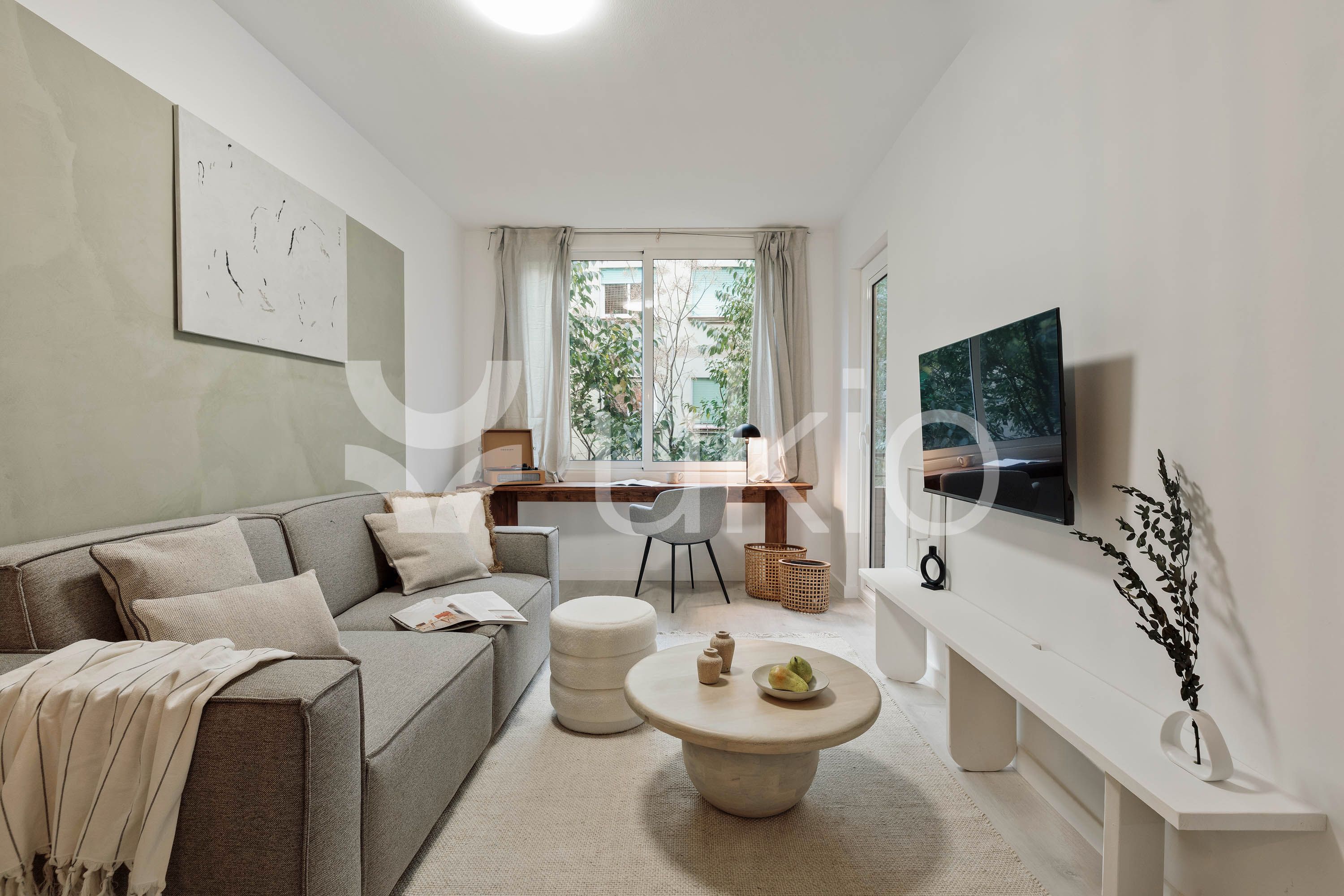Sala d'estar de Apartament de lloguer en  Barcelona Capital amb Aire condicionat, Calefacció i Moblat