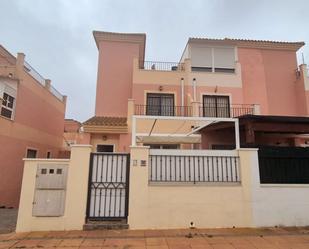 Exterior view of Single-family semi-detached for sale in Los Alcázares  with Air Conditioner, Heating and Private garden