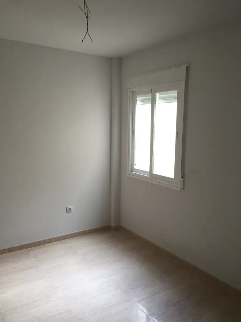 Schlafzimmer von Wohnungen zum Verkauf in Fuente Vaqueros mit Ofen und Waschmaschine