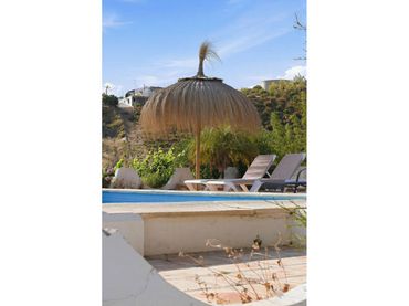 Casa rústica con piscina en venta en Vélez-Málaga ciudad